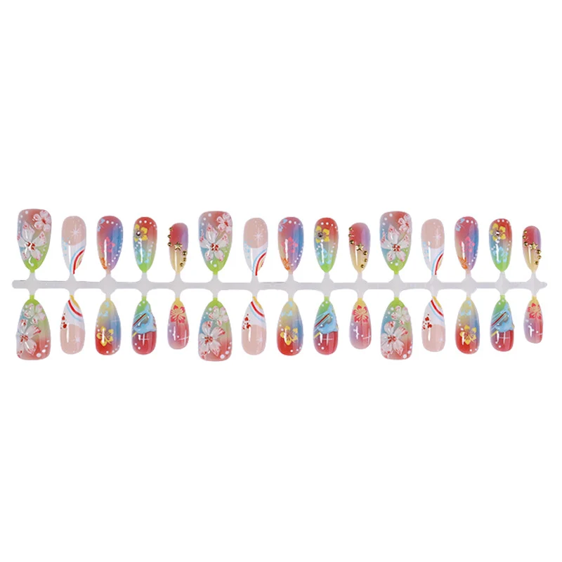 Kunstnagelset mit kreativen Blumen- und Regenbogenmustern Karnz