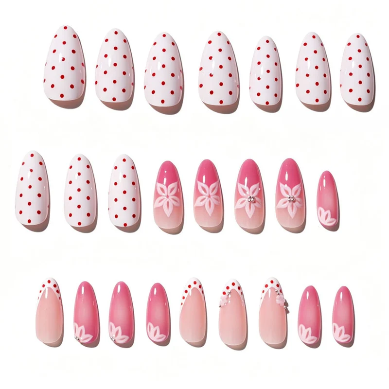 Kunstnagelset mit floralen Akzenten und charmanten Polka-Dots Karnz