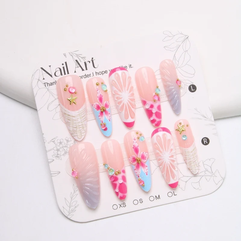 Kunstnagelset mit floralem und fröhlichem Design Karnz