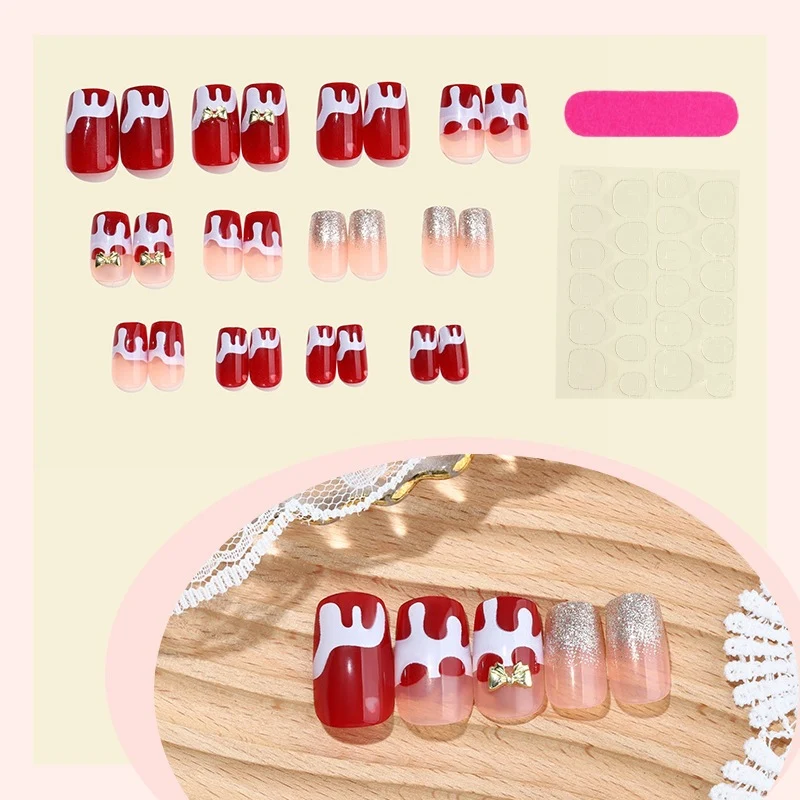 Kunstnagelset mit festlichen Weihnachtsmotiven Karnz