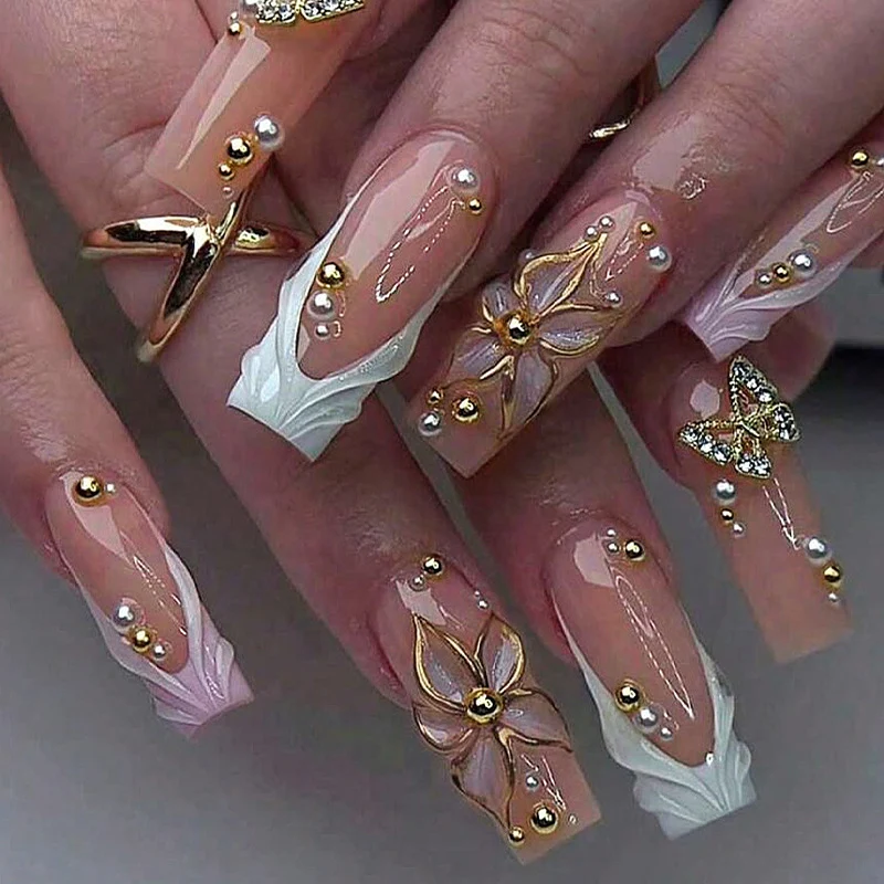 Kunstnagelset mit exklusiven Blüten- und Glitzerelementen Karnz