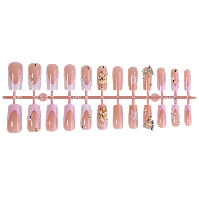 Kunstnagelset mit exklusiven Blüten- und Glitzerelementen Karnz
