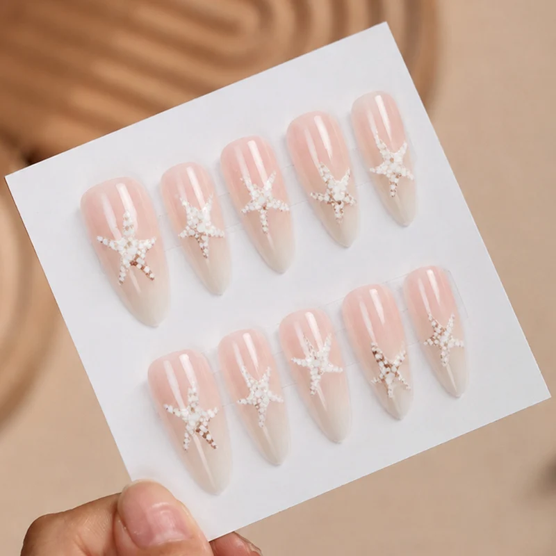 Kunstnagelset mit eleganten Stern-Motiven Karnz