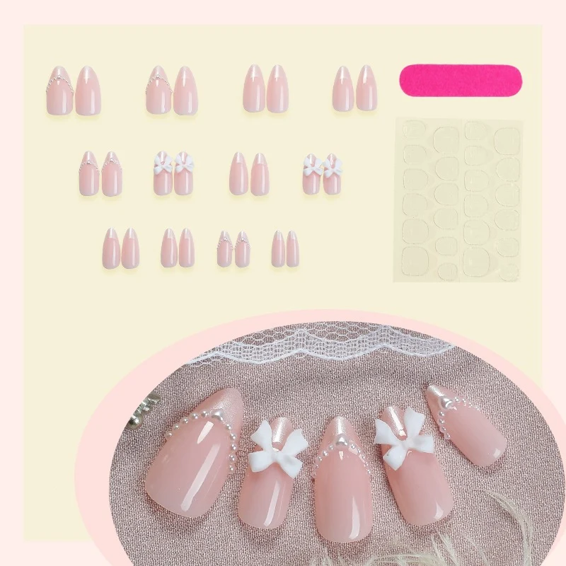Kunstnagelset mit eleganten Schleifen und Perlen Karnz