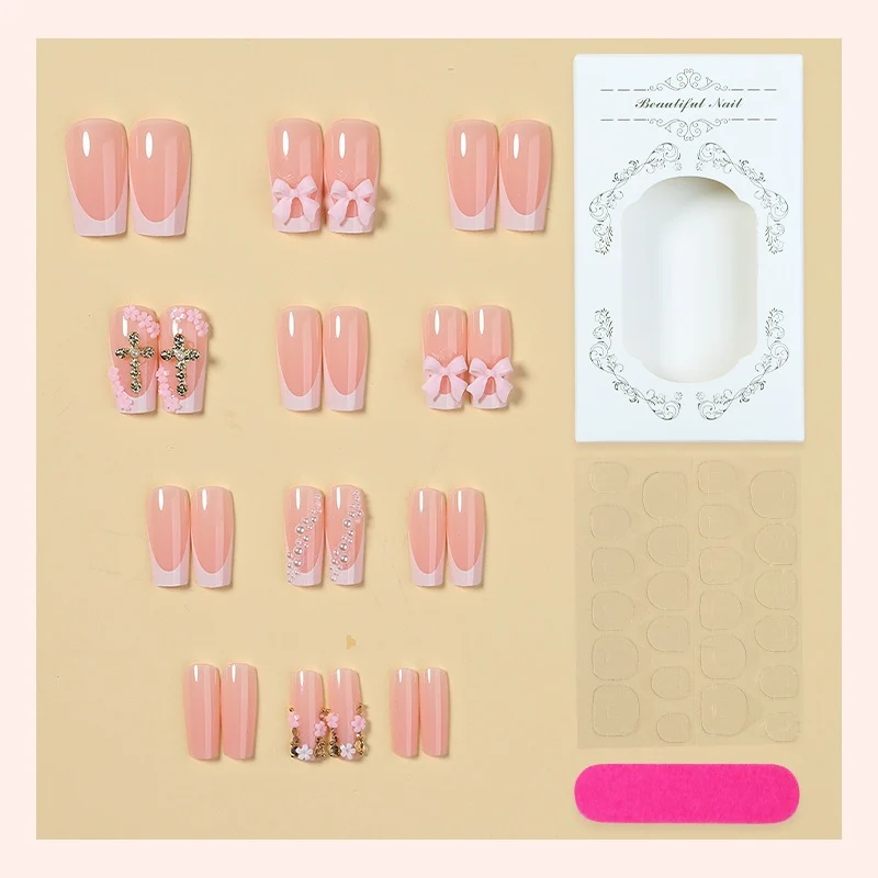 Kunstnagelset mit eleganten Schleifen- und Glitzerelementen Karnz