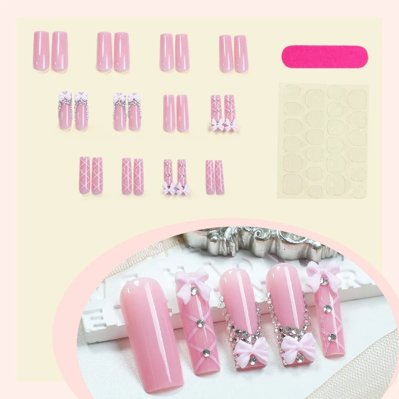 Kunstnagelset mit eleganten Schleifen- und Glitzerakzenten Karnz