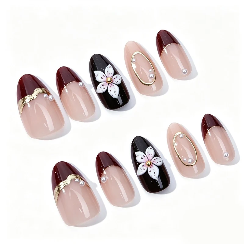 Kunstnagelset mit eleganten Blüten- und Glitzerdetails Karnz