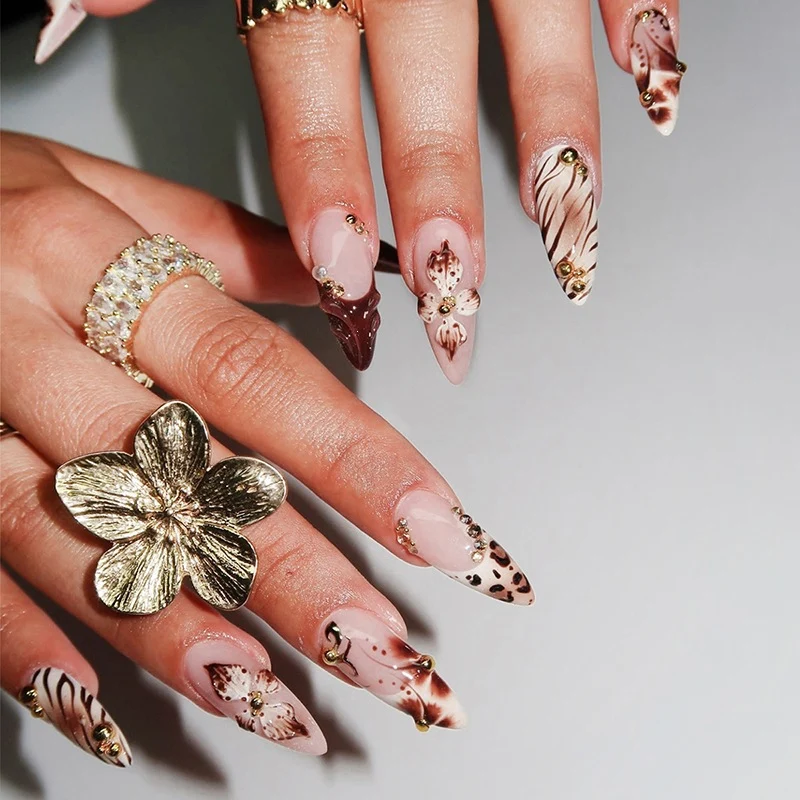 Kunstnagelset mit elegantem Tier- und Blumen Design Karnz