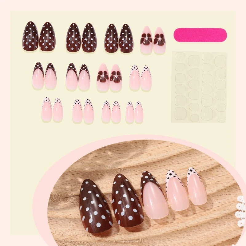 Kunstnagelset mit elegantem Punkt- und Blumen-Design Karnz