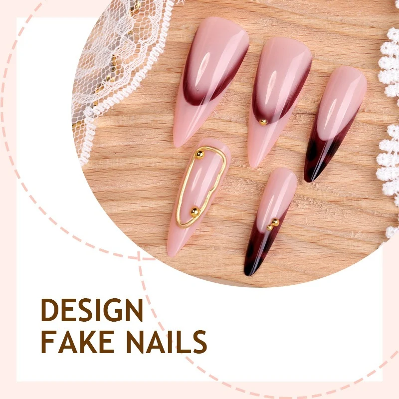 Kunstnagelset mit elegantem Ombre-Design und goldenen Akzenten Karnz