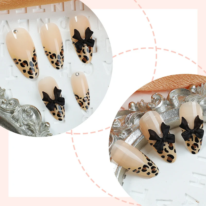 Kunstnagelset mit elegantem Leopardenmuster und glamourösen 3D-Elementen Karnz