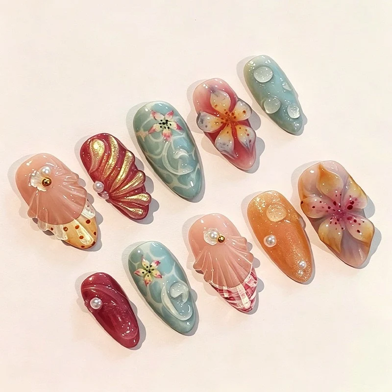 Kunstnagelset mit einzigartigen floralen und maritimen Designs Karnz