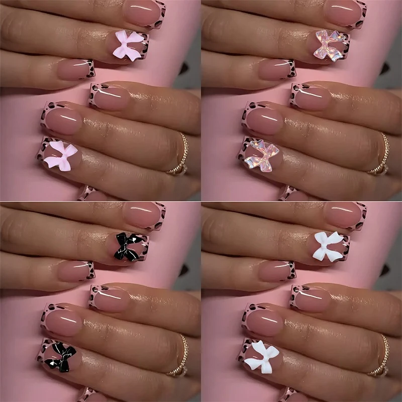 Kunstnagelset mit bunten Schleifen- und Leopardenmotiven Karnz