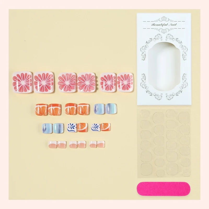 Kunstnagelset mit bunten Blumen- und Fruchtmotiven Karnz