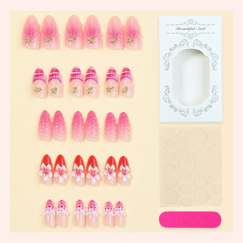 Kunstnagelset mit blühenden 3D-Details und Glitzerakzenten Karnz