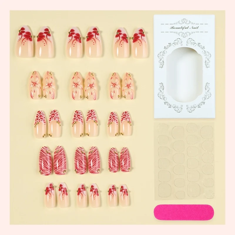 Kunstnagel Set mit floralen Designs und Glitzerelementen Karnz